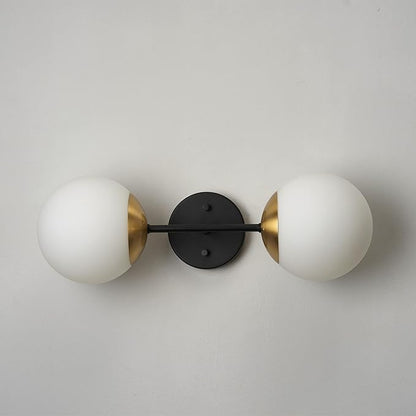 GLOBE Electric 52079 2-Light Wall Sconce, Matte Black, Antique Brass Accent Socket, Matte Opal Glass Shades, Modern Light for Living Room or Bedroom, Dimmer Switch Compatible, E26 Base