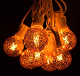Hometown Evolution, Inc. Gold Outdoor Patio String Lights (50 ft, G50 Gold 2" Bulbs - White Wire) | Lumora