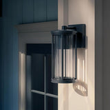 Kichler Barras 11.5" 1-Light Outdoor DarkSky Approved Wall Sconce with Clear Ribbed Glass in Black, Vertical Mount | Lumora
