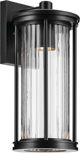 Kichler Barras 16" 1-Light Outdoor DarkSky Approved Wall Sconce with Clear Ribbed Glass in Black, Vertical Mount | Lumora