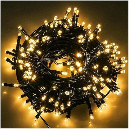 Fairy Black String Lights with Memory Function. Extendable 33ft 100 LED Plug in Cozy Warm White Decorations for Christmas Xmas Tree, Garden, Party, or Home, creating magical indoor outdoor Ambiance