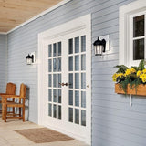 Kichler Courtyard 11" 1 Light Outdoor Wall Light with Clear Seeded Glass in Textured Black, 16-Inch | Lumora