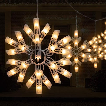 Minetom Snowflake Christmas String Lights - 2 Pack 6 Drops 8.8 Ft. 100 Mini Bulb Snowflake Icicle Lights with Hooks Connectable Hanging Lights for Xmas Rooftop Home Indoor Outdoor Party Wedding