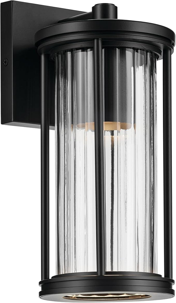 Kichler Barras 11.5" 1-Light Outdoor DarkSky Approved Wall Sconce with Clear Ribbed Glass in Black, Vertical Mount | Lumora