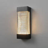 Globe Electric 16W LED Integrated Outdoor Wall Sconce, Matte Black, Ribbed Glass, Dusk to Dawn Sensor, Dimmable | Lumora