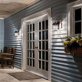 Kichler Courtyard 11" 1 Light Outdoor Wall Light with Clear Seeded Glass in Rubbed Bronze | Lumora