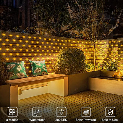 Solar LED Net Lights 9.8 x 6.6Ft, 200 LEDs Net Mesh Lights, Solar Outdoor Bush Mesh Light Dark Green Cable with 8 Modes for Trees Bushes Garden Yard Decoration - Warm White