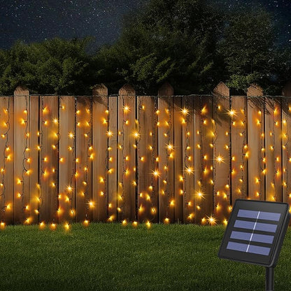 DBFAIRY Solar Curtain Lights,19.6ft x 3.3ft 300 LED Outdoor Christmas Solar Curtain Lights Waterproof Green Wire with 8 Mode for Garden Handrail Railing Eaves Wall Decoration -Warm White