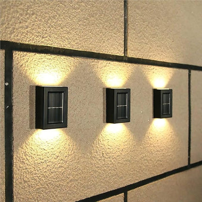 QUQUQ Solar Pathway Lights Solar Wall Lights Outdoor LED Up and Down Waterproof Power-Saving Yard Patio Decor(Warm White,4 Pack)