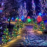 Upgraded 4-Pack Solar Christmas Garden Stake Lights, Decorative Xmas Tree Solar Christmas Yard Stake Outdoor | Lumora