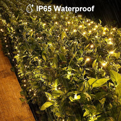 Solar LED Net Lights 9.8 x 6.6Ft, 200 LEDs Net Mesh Lights, Solar Outdoor Bush Mesh Light Dark Green Cable with 8 Modes for Trees Bushes Garden Yard Decoration - Warm White