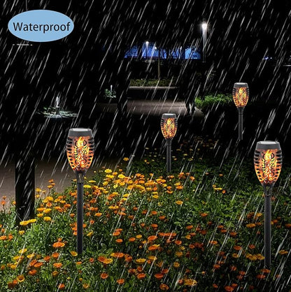 4Pcs Solar Flame Flickering Lamp Torch，Solar Garden Lights Outdoor Waterproof for Courtyard, Garden, Seaside, Balcony, Terrace, Lawn. (Orange)