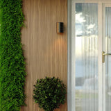 VAXCEL Chiasso 7.25 in. H 1-Light Textured Black Dusk to Dawn Sensor Outdoor Wall Sconce Rust-Resistant Aluminum | Lumora