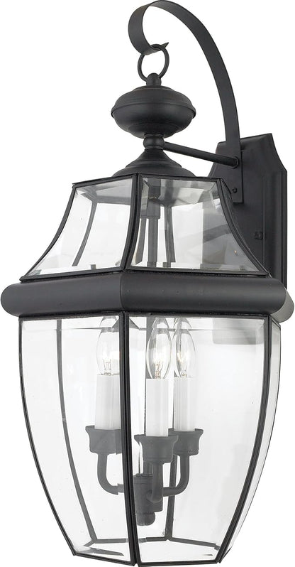 Quoizel Newbury Outdoor Wall Lantern, 23 Inch 3-Light Mystic Black Wall Sconce, French Country Exterior Wall Lantern Fixture, E12 Base, Clear Glass, Outside Lights for Patio, Porch, Garage or Yard