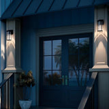 Kichler Barras 11.5" 1-Light Outdoor DarkSky Approved Wall Sconce with Clear Ribbed Glass in Black, Vertical Mount | Lumora