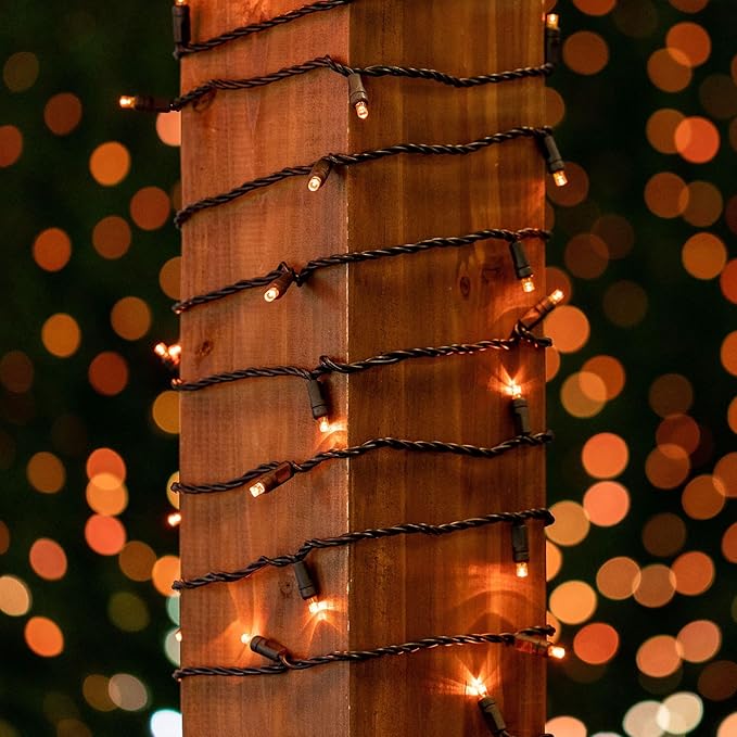 Novelty Lights 25ft Christmas String Lights, 50 Amber/Orange LED Bulbs on Black Wire, 6" Spacing, Connectable Indoor Outdoor Commercial Grade Lighting for Holidays Patio Weddings