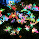 JJGoo 2 Pack Solar Garden Lights, Solar Butterfly Swaying Light for Outside, New Upgraded Outdoor Waterproof Light | Lumora